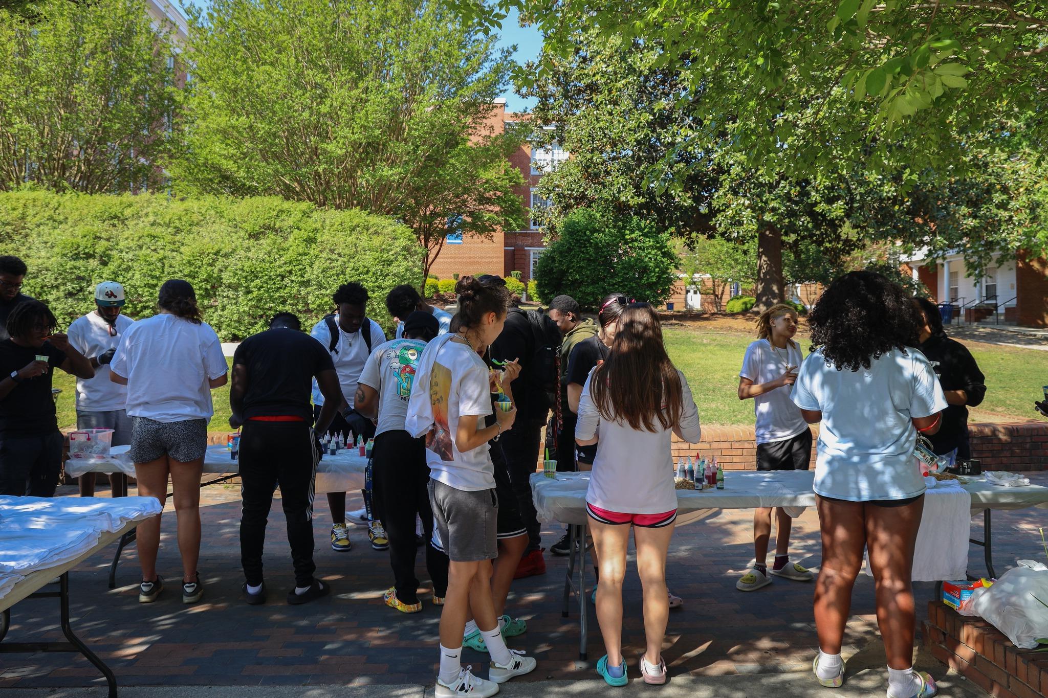 Students participating in the SGA tie dye tshirt event.